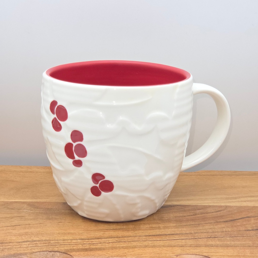 Starbucks 2010 Hand Painted Embossed Holly Berry Coffee Mug White Red Christmas